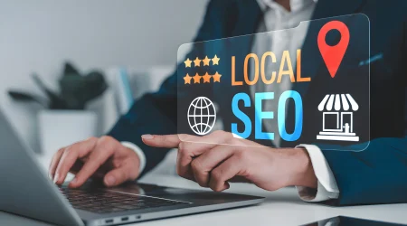 businessman-pointing-local-s-e-o-graphic-transparent-screen-laptop-white-desk